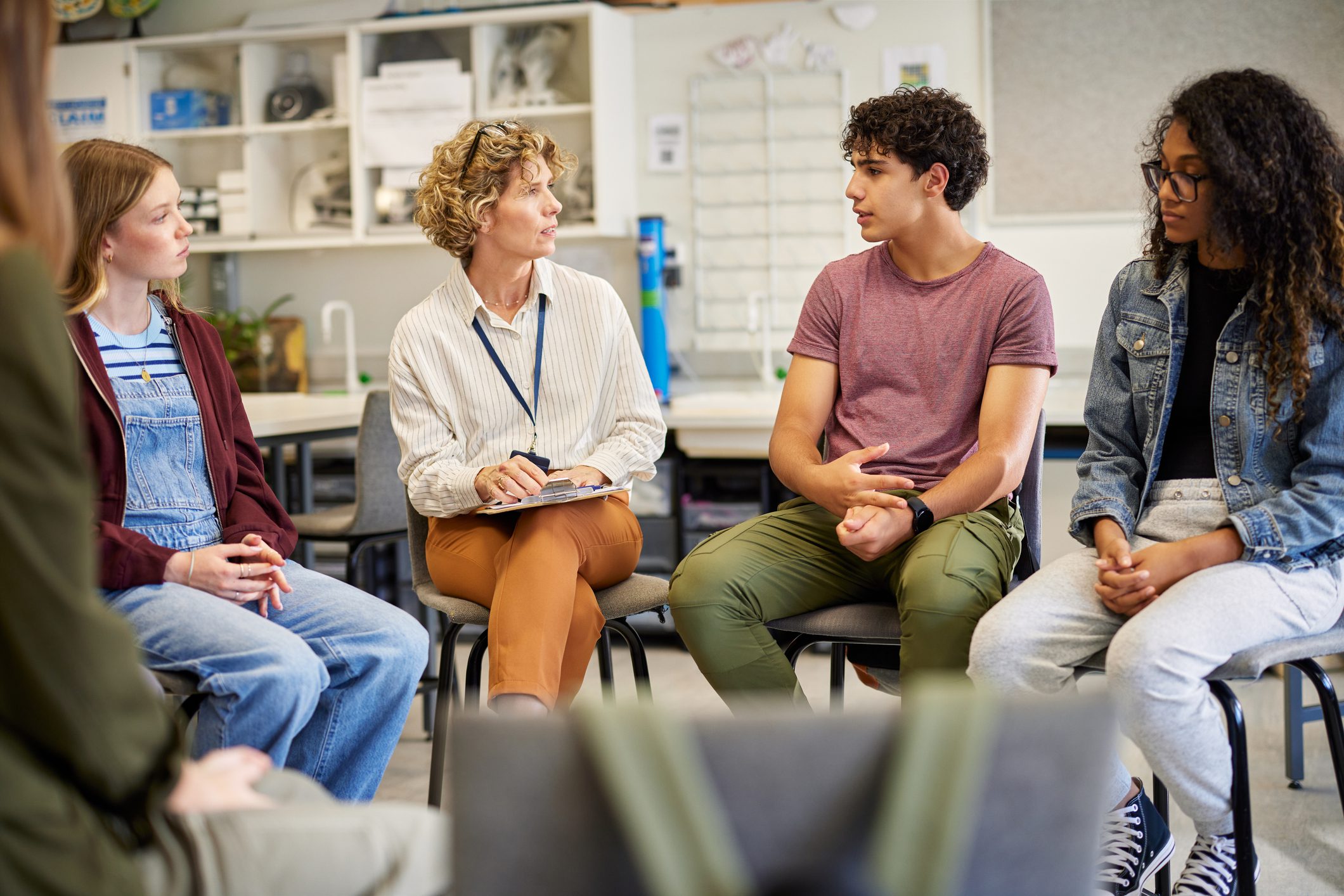 Group of discussion and support in classroom Intensive Outpatient Programs (IOP)